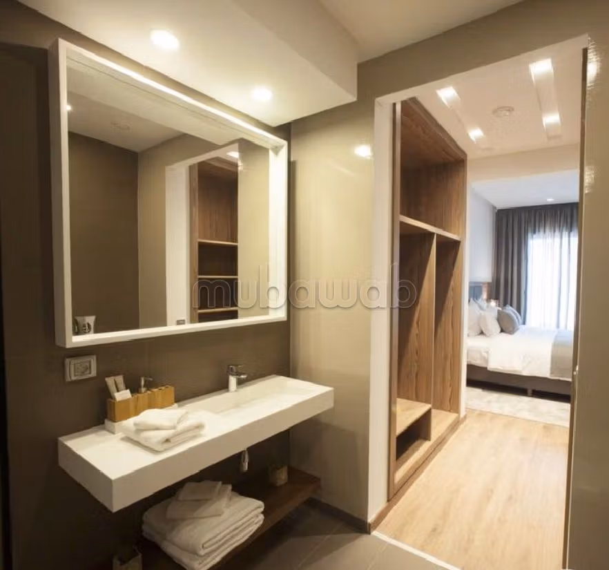 Huurappartementen in Ain Diab. Totale oppervlakte 75 m². Conciërge en zwembad. 