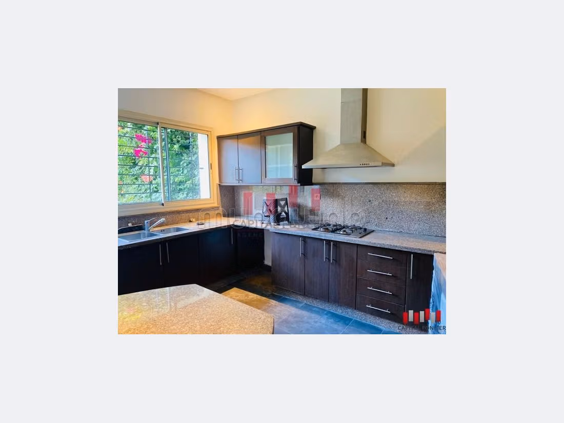 Villa ain diab au calme beau jardin