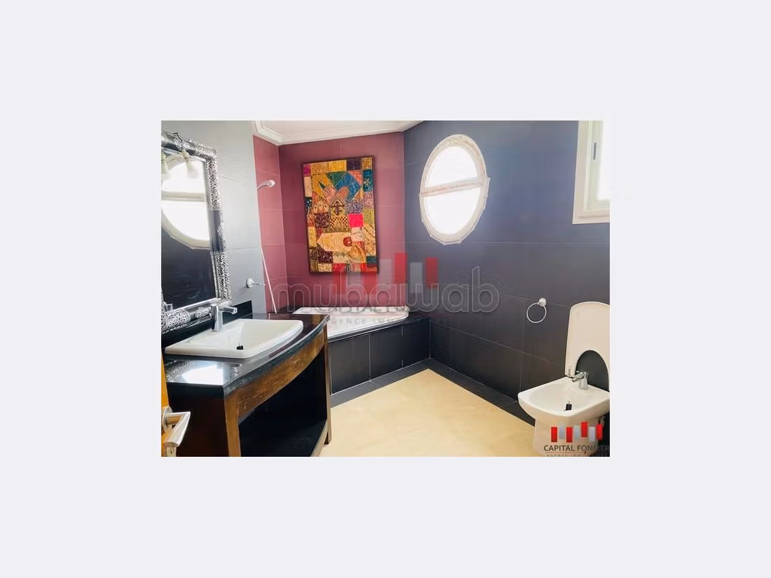 High quality villa rental in Ain Diab. Small area 1400 m². Air-conditioned. 