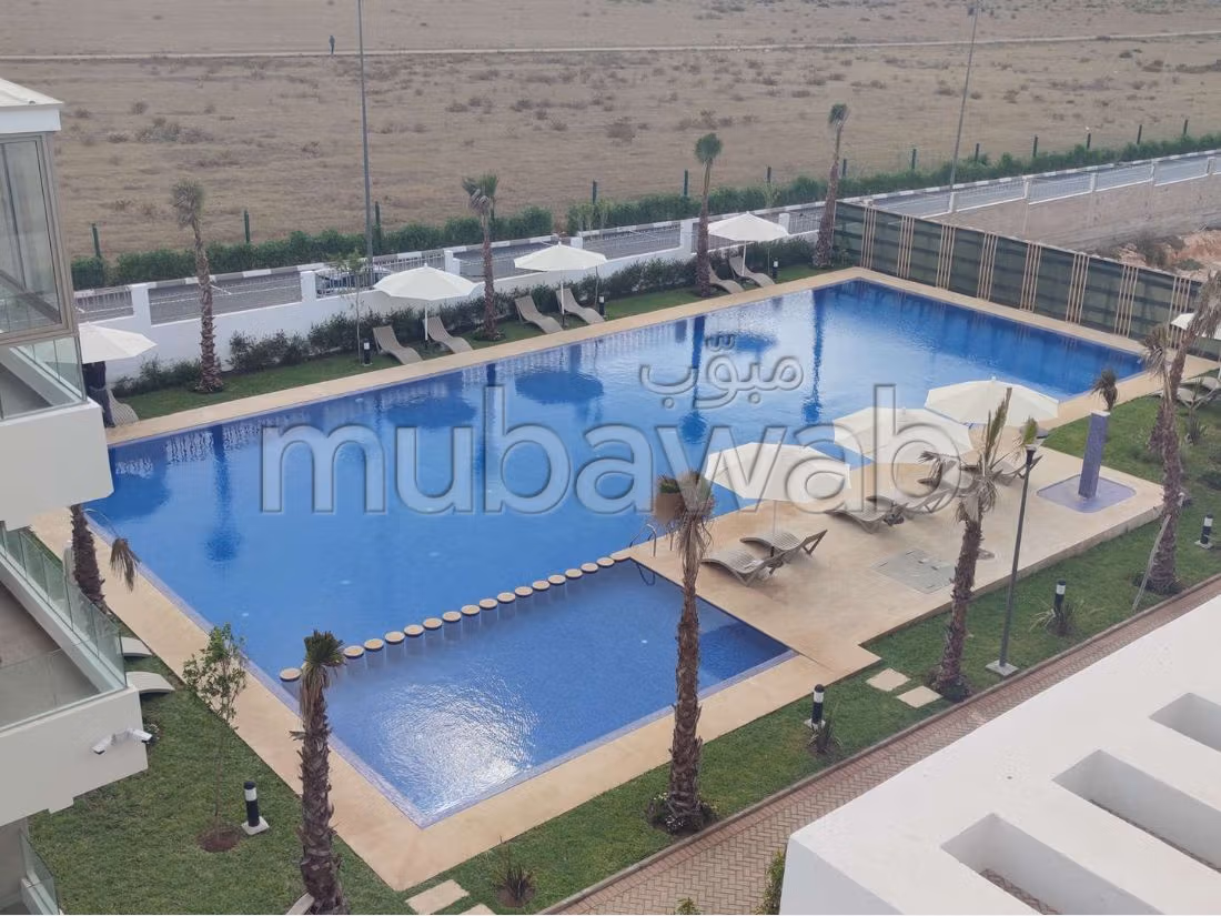 Apartment for sale. 3 large living areas. Satellite dish system and secured residence