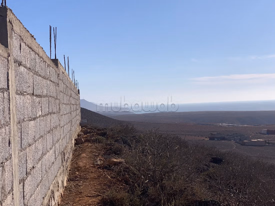 Beau terrain avec vue mer dégagée - TITRE
