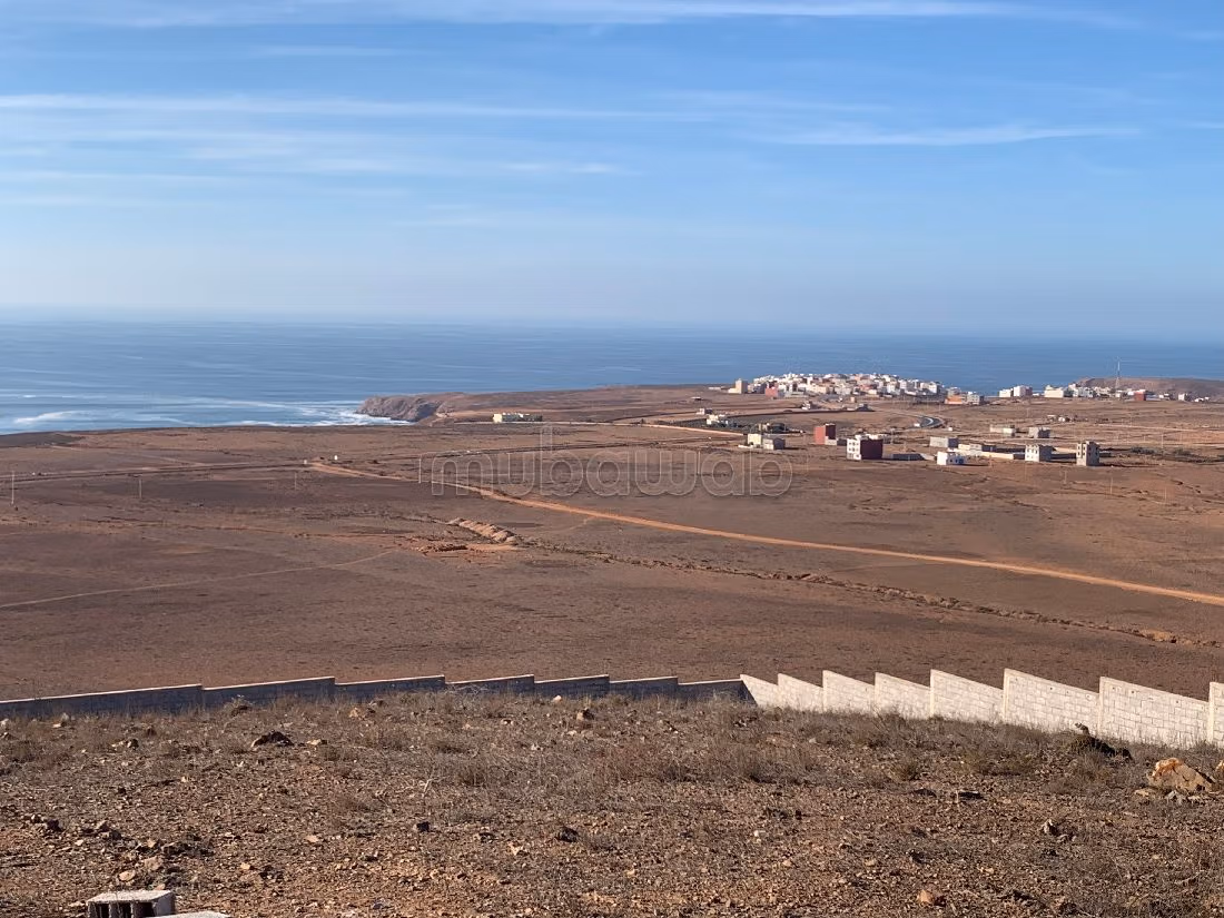 Beau terrain avec vue mer dégagée - TITRE