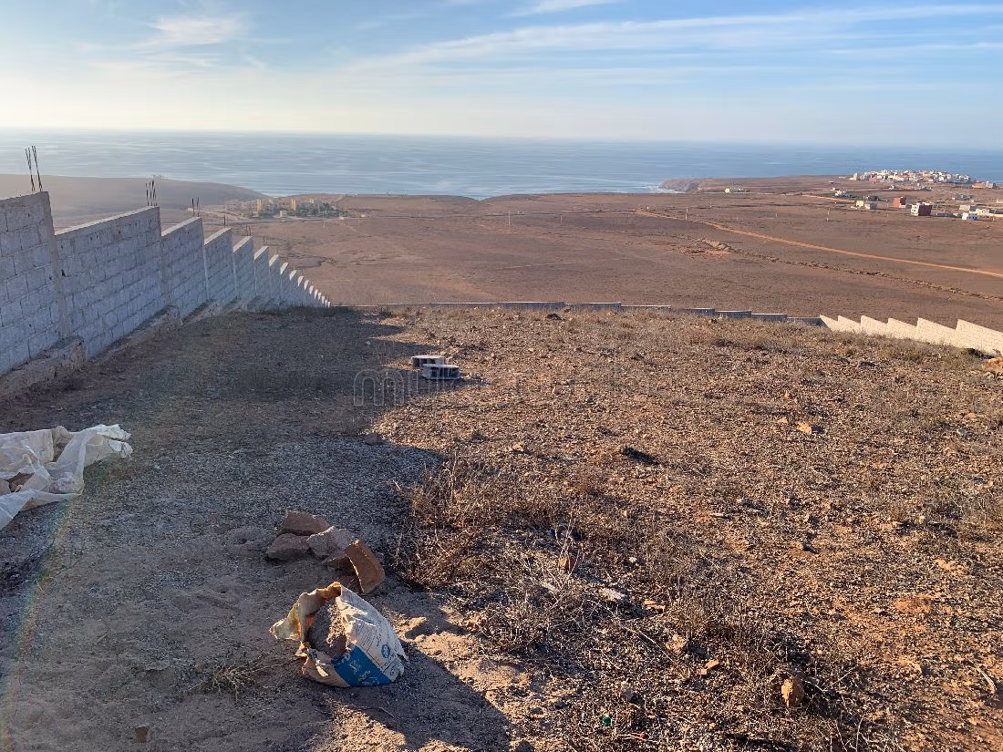 Beau terrain avec vue mer dégagée - TITRE