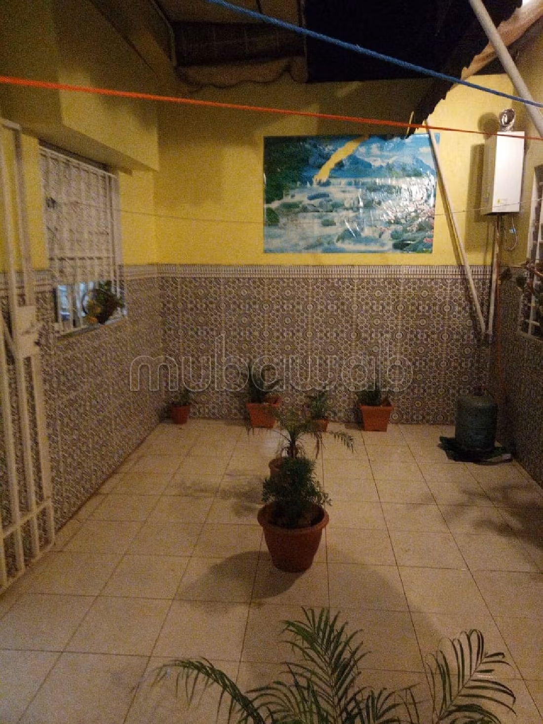 Apartment for sale in Wifak. 5 large rooms. Secured door, furnished Moroccan living room