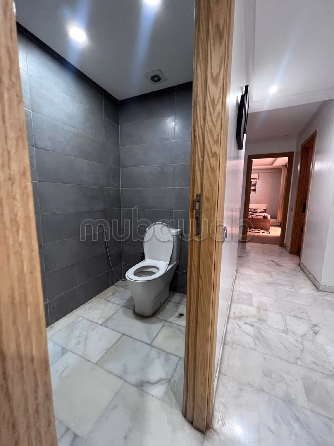 Appartement de vacances à louer à Guéliz. Surface totale 120 m². Places de stationnement et terrasse.