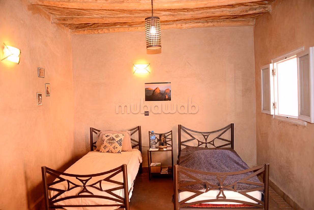 Vendita di uno splendido riad a Assarag. 9 ampi locali. Salotto tradizionale marocchino. 