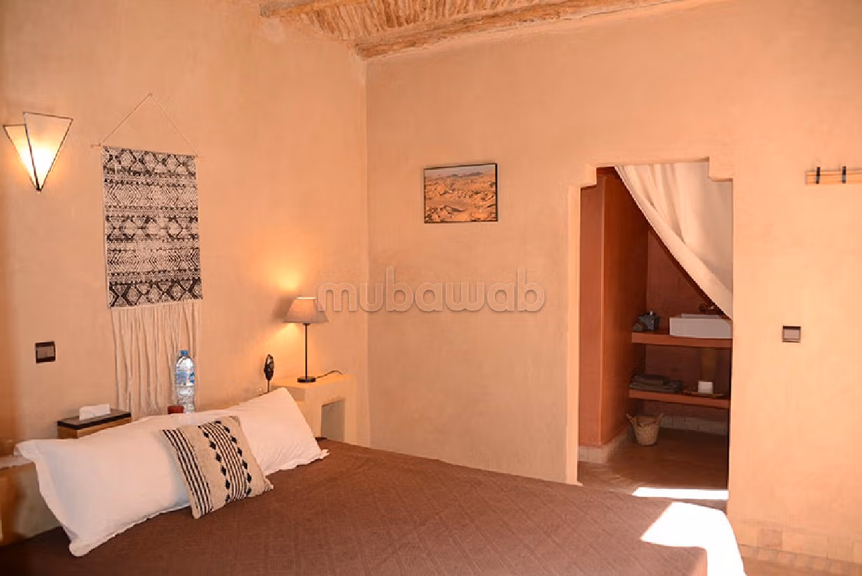 Vendita di uno splendido riad a Assarag. 9 ampi locali. Salotto tradizionale marocchino. 