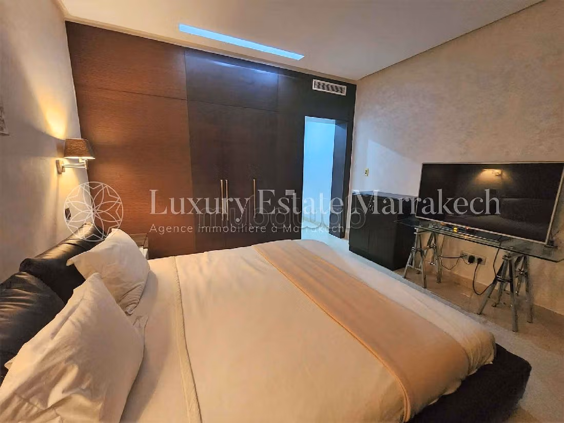 Piso en venta en Guéliz. 2 hermosas habitaciones. Residencia con conserje, aire condicionado general. 