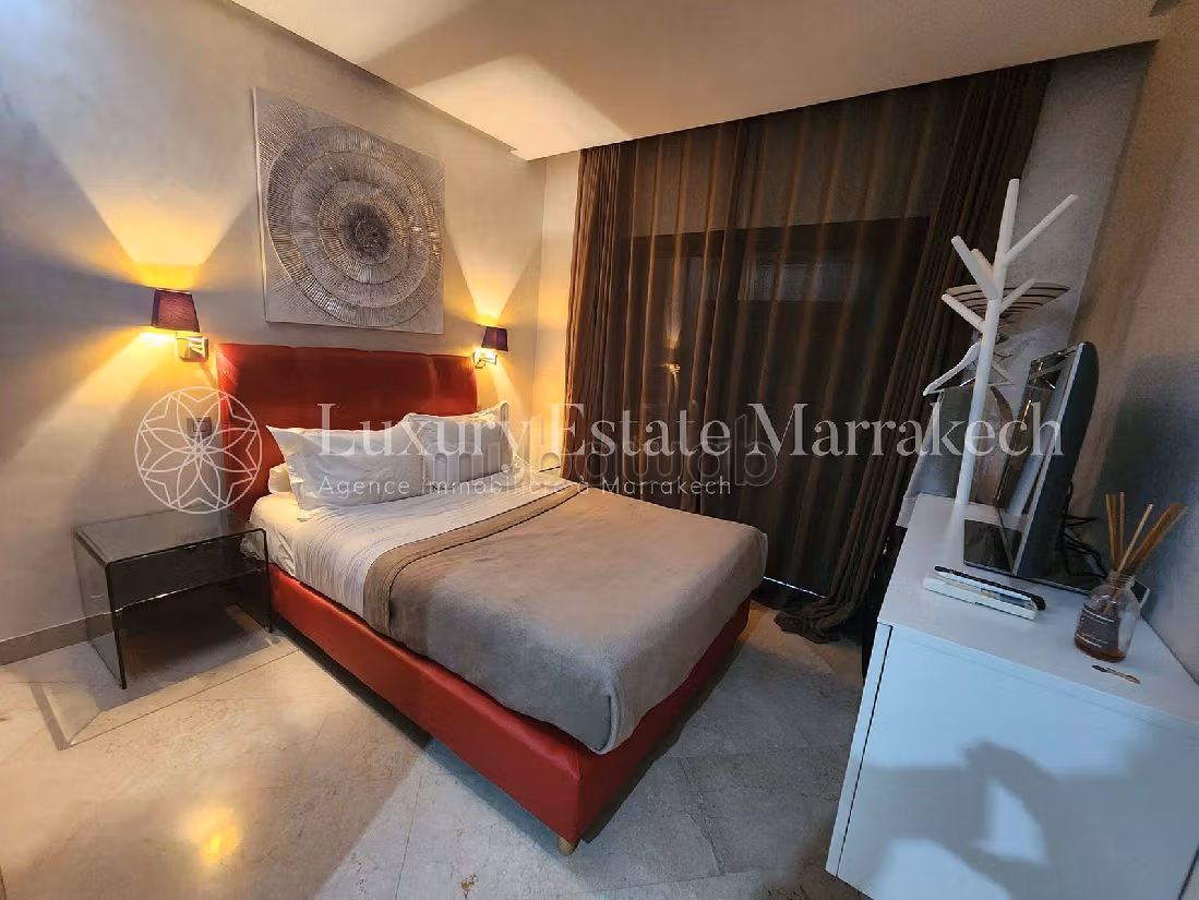 Piso en venta en Guéliz. 2 hermosas habitaciones. Residencia con conserje, aire condicionado general. 