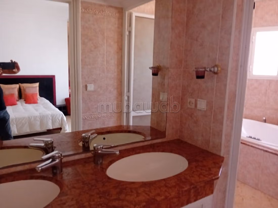 Fabulous villa for rent in Ain Diab. 5 large living areas. Green areas, Balcony. 