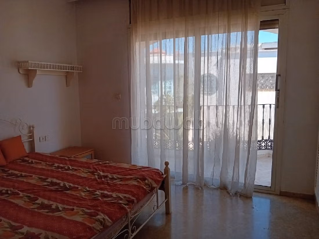 Fabulous villa for rent in Ain Diab. 5 large living areas. Green areas, Balcony. 