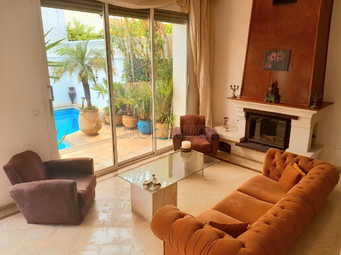 Magnificent villa for rent in Ain Diab. 7 rooms. Living room with fireplace, General air conditioning System. 