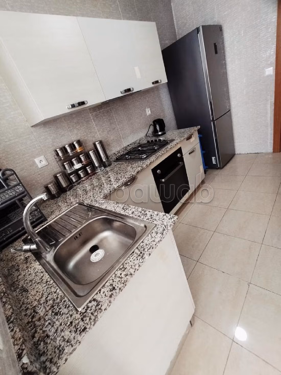 Piso en venta en Hay Mohammadi. Área total 104 m². Jardín privado, sin ascensor. 