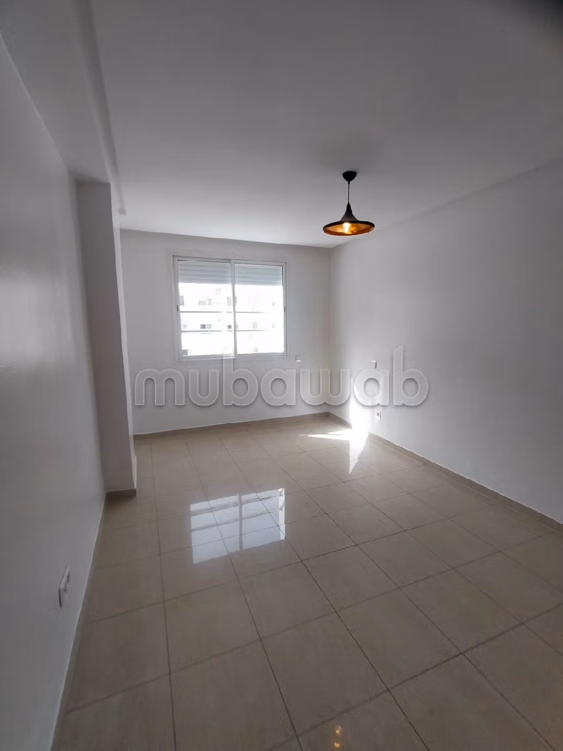 بيع شقة بالحي المحمدي. 2 غرف. موقف السيارات وشرفة. 