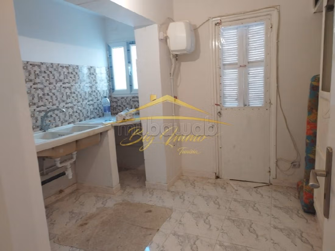 Appartement au RDC d'un immeuble à Bouhsina