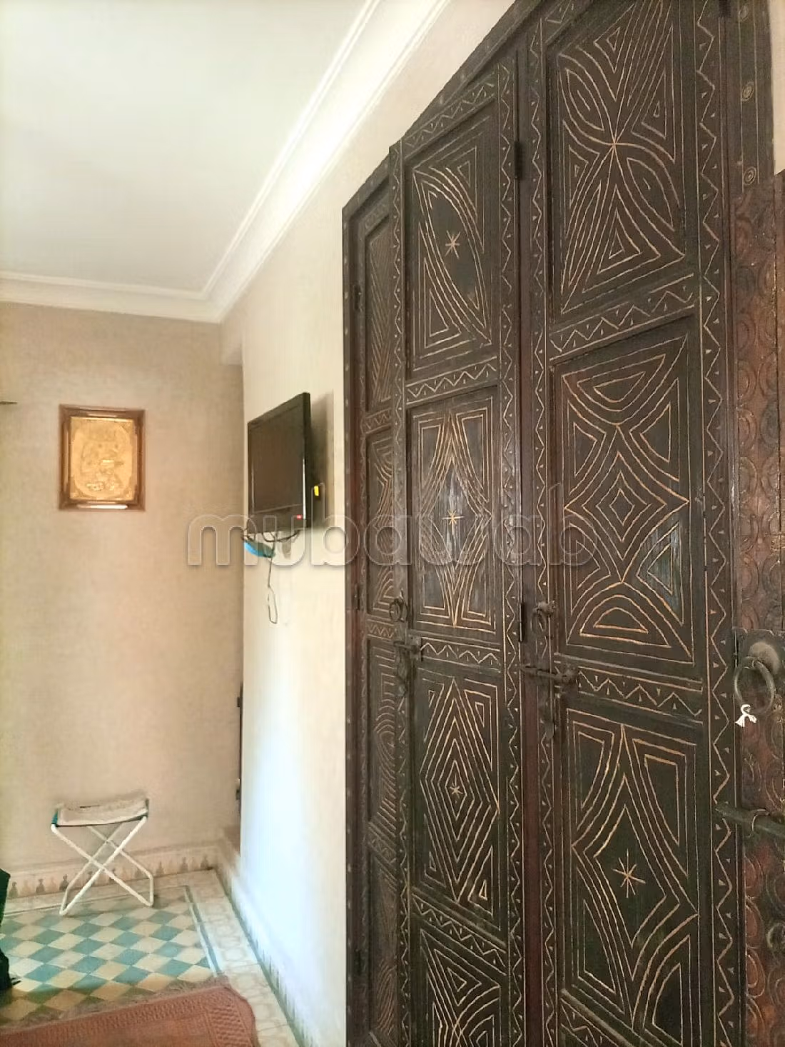 رياض للبيع ب أغفي. المساحة الإجمالية 2070 م². مدفئة مركزية وباب متين. 