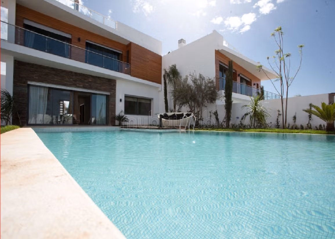 Lujosa villa en alquiler en Ain Diab. 6 dormitorios. Chimenea funcional, piscina grande