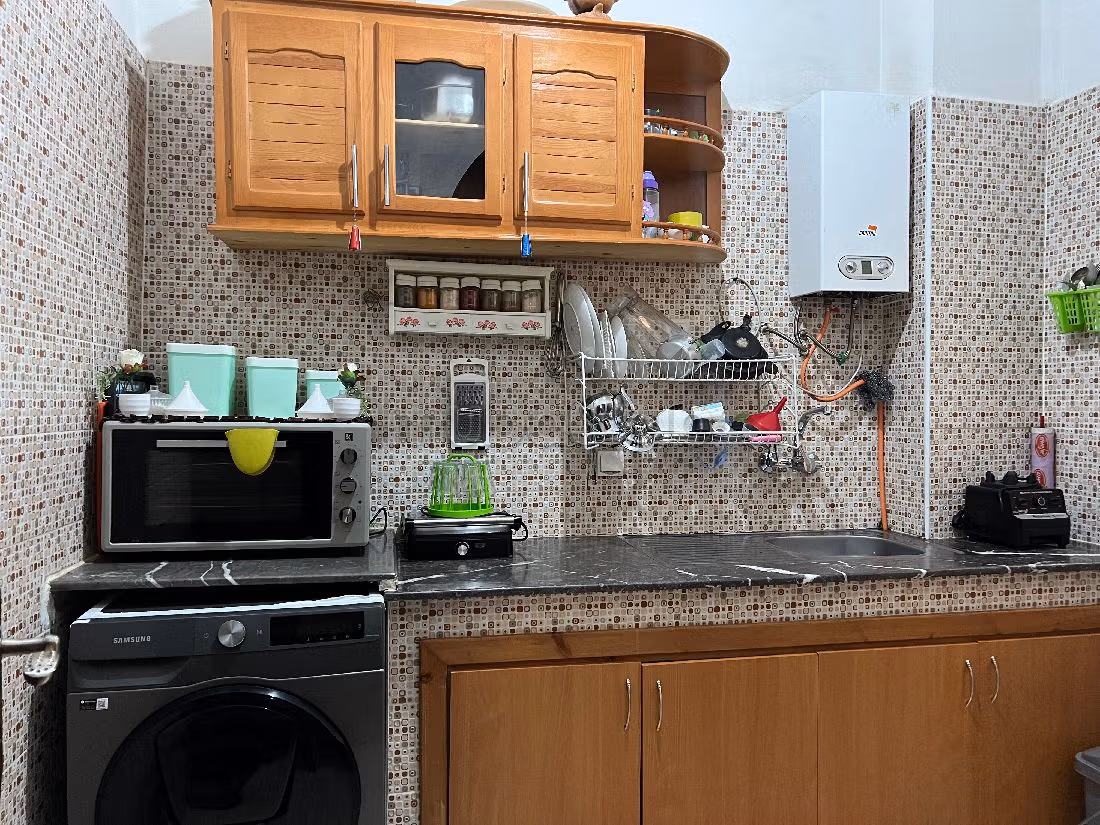 Apartments for rent in Tanja Balia. 3 rooms. Typical Moroccan living room, secured residence.