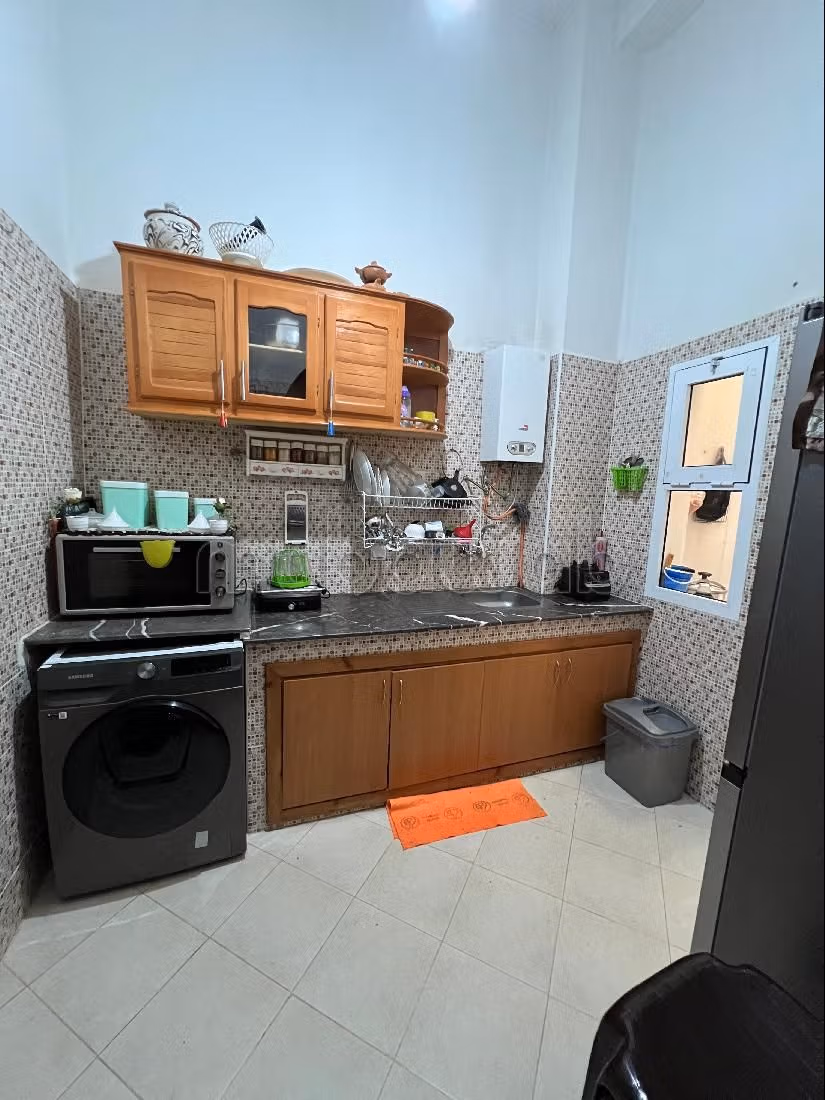 Apartments for rent in Tanja Balia. 3 rooms. Typical Moroccan living room, secured residence.