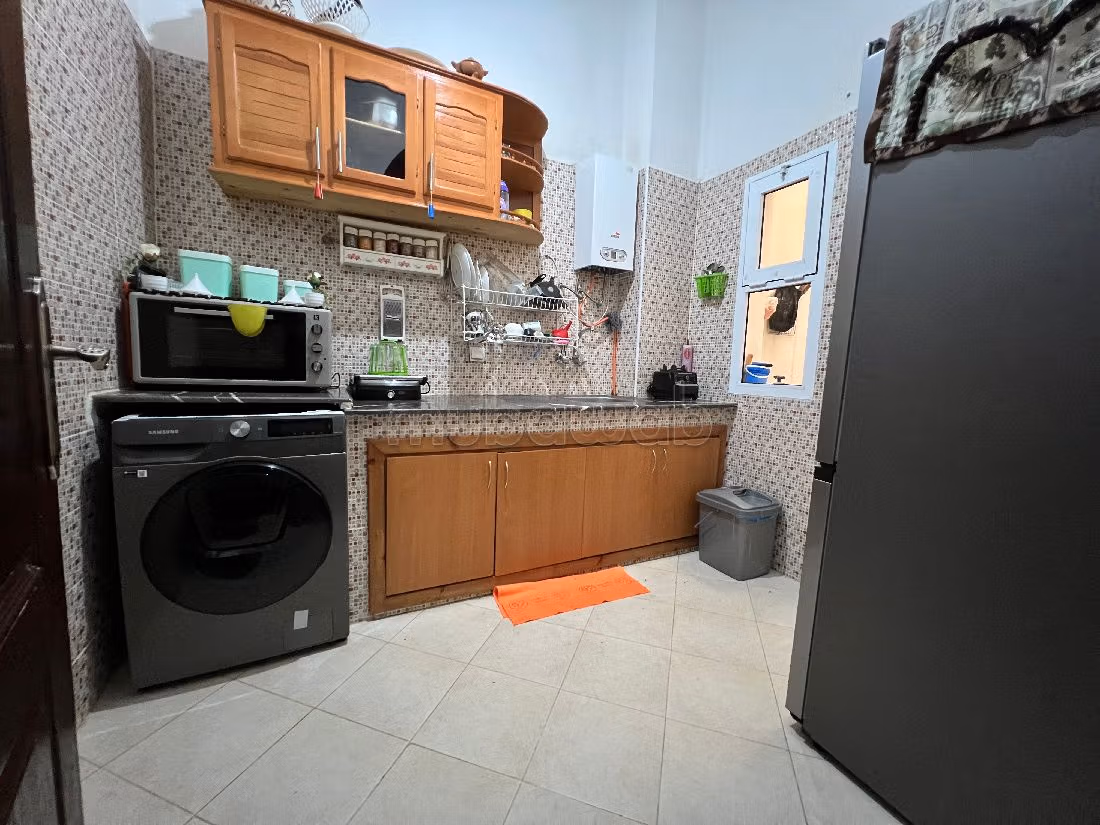 Apartments for rent in Tanja Balia. 3 rooms. Typical Moroccan living room, secured residence.