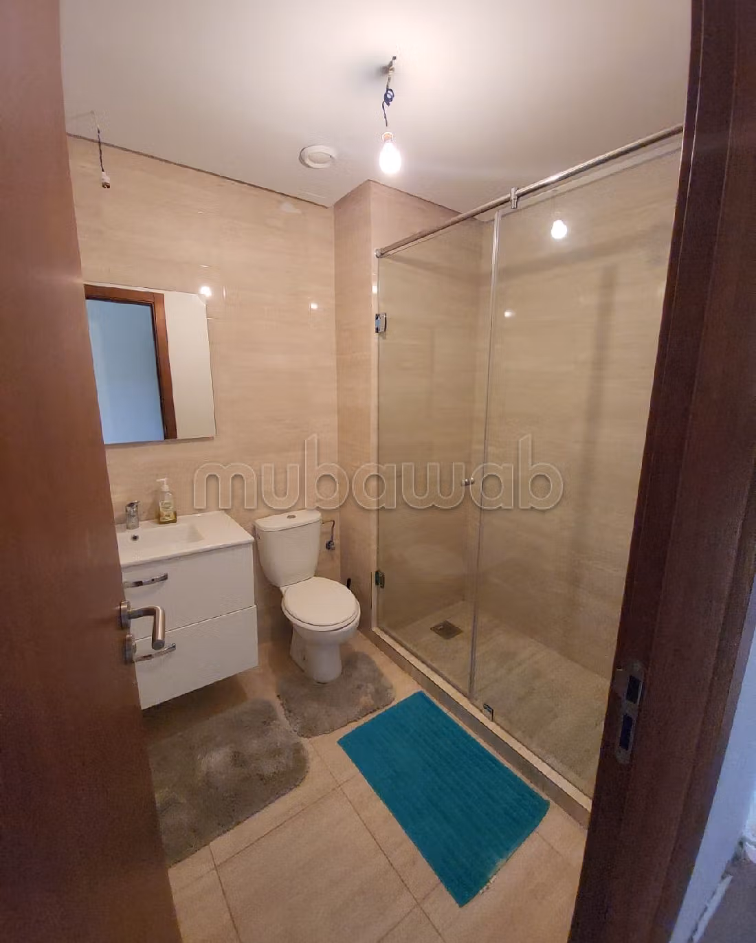 شقة للإيجار بأكدال. المساحة الكلية 90 م². 