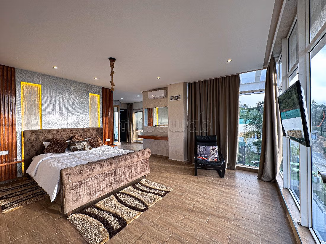 Luxury villas & houses for rent in Cap Spartel. 3 lovely rooms. Living room with fireplace, General air conditioning System. 