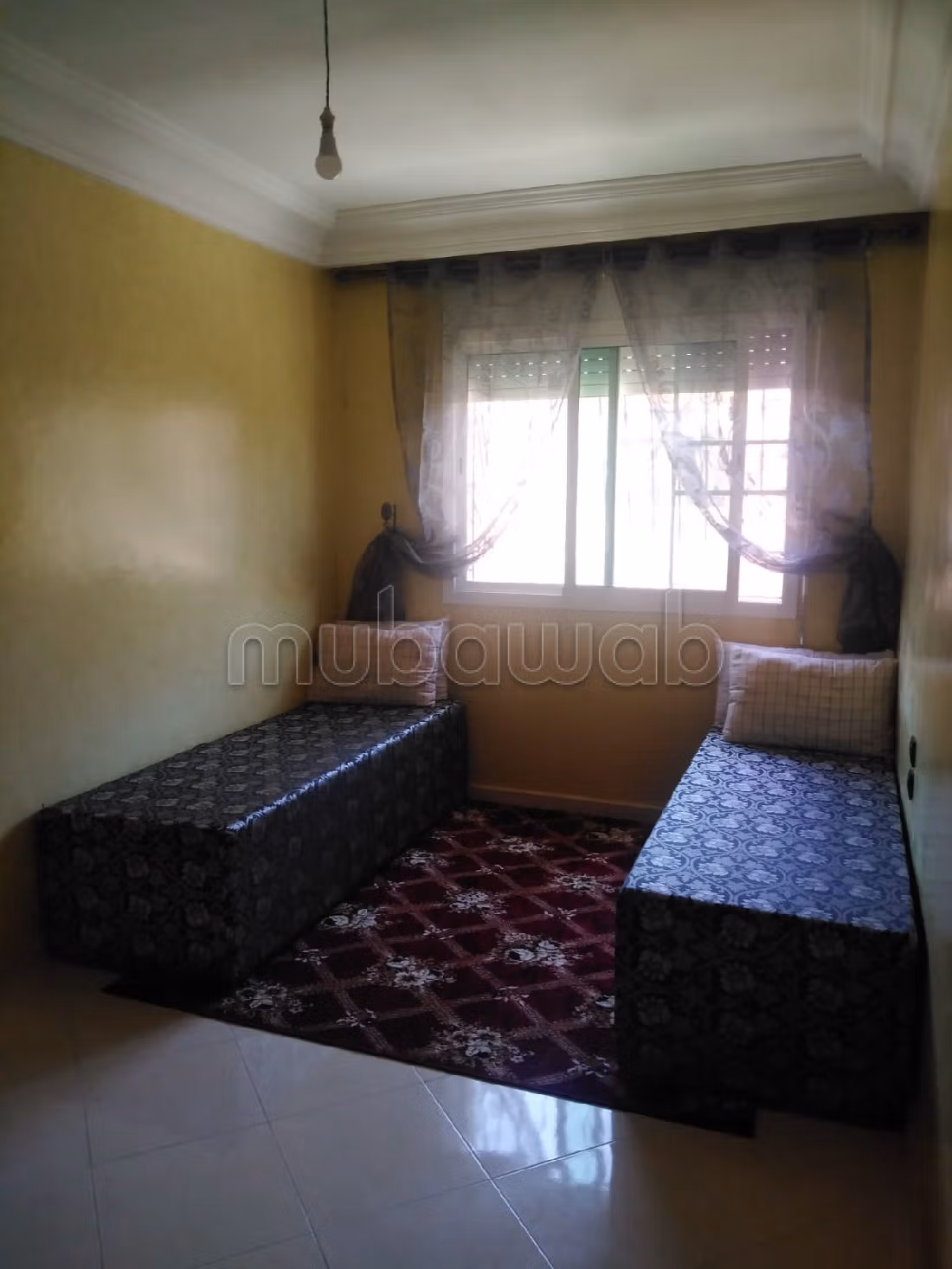 شقة جميلة للبيع بسيدي رحال الشاطئ. المساحة الإجمالية 72 م². صحن فضائي وباب متين وممتاز