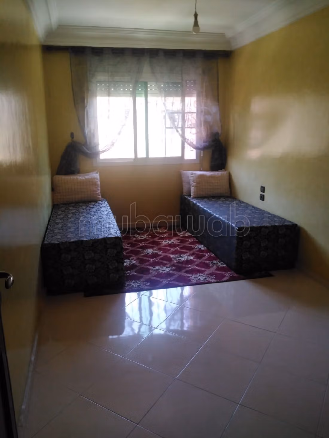 شقة جميلة للبيع بسيدي رحال الشاطئ. المساحة الإجمالية 72 م². صحن فضائي وباب متين وممتاز