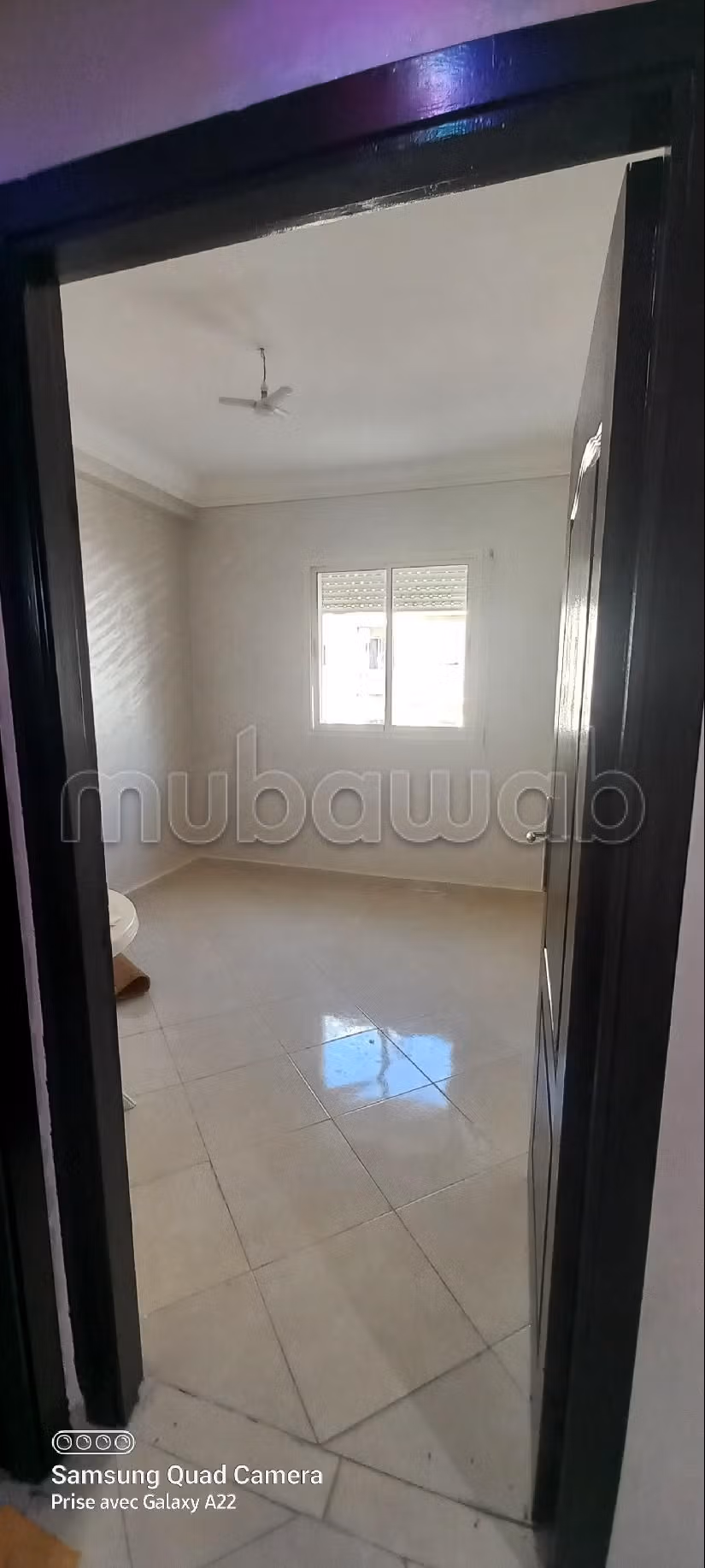 Find an apartment to buy in Lissasfa. 3 comfortable rooms. Living room with Moroccan decor, General satellite dish system