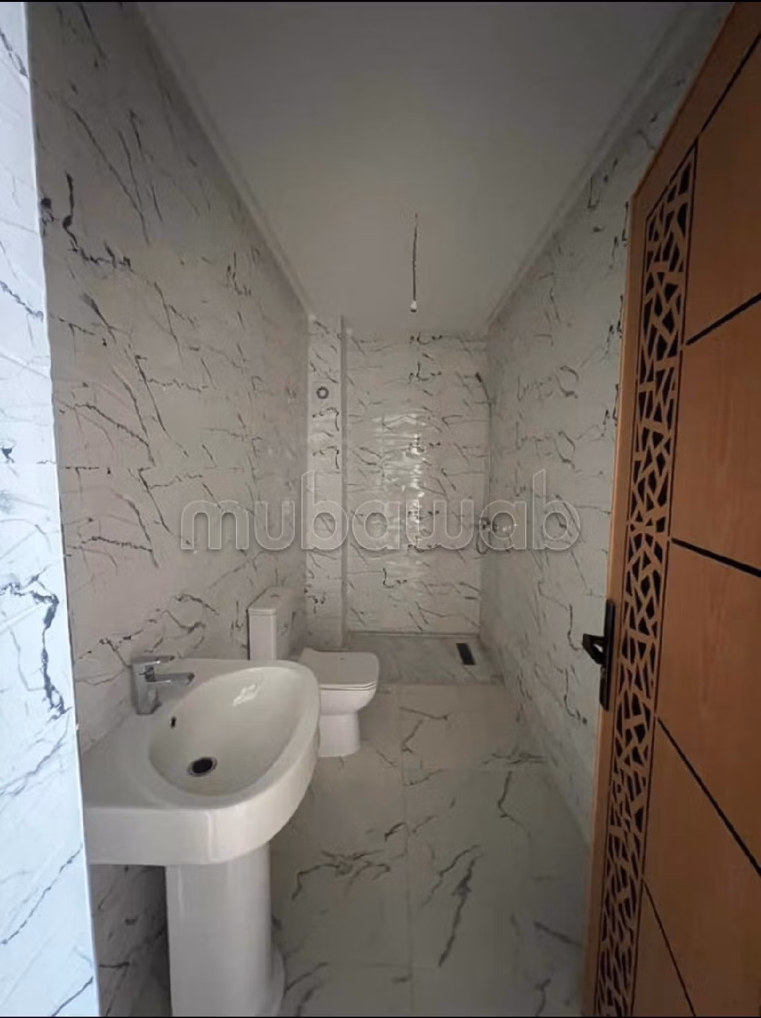 Appartementen kopen in Ziaten. Totale oppervlakte 88 m². Traditionele, Marokkaanse woonkamer en satellietschotel. 