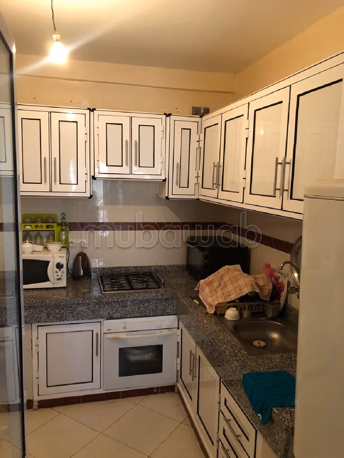 شقة للبيع بتزنيت. المساحة الإجمالية 96 م². صالة أصيلة ، طبق الأقمار الصناعية