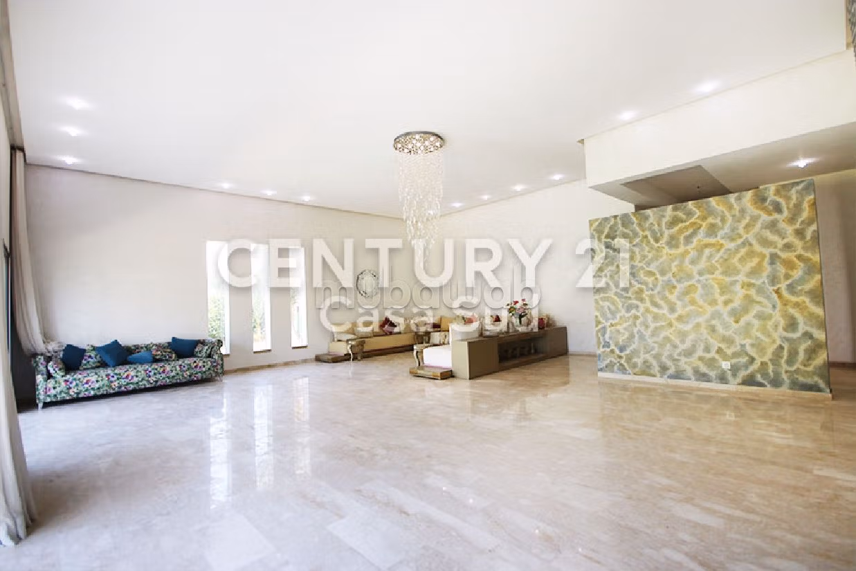 Luxury villa for sale in Bouskoura Ville. Large area 1035 m². Usable fireplace, Large swimming pool. 