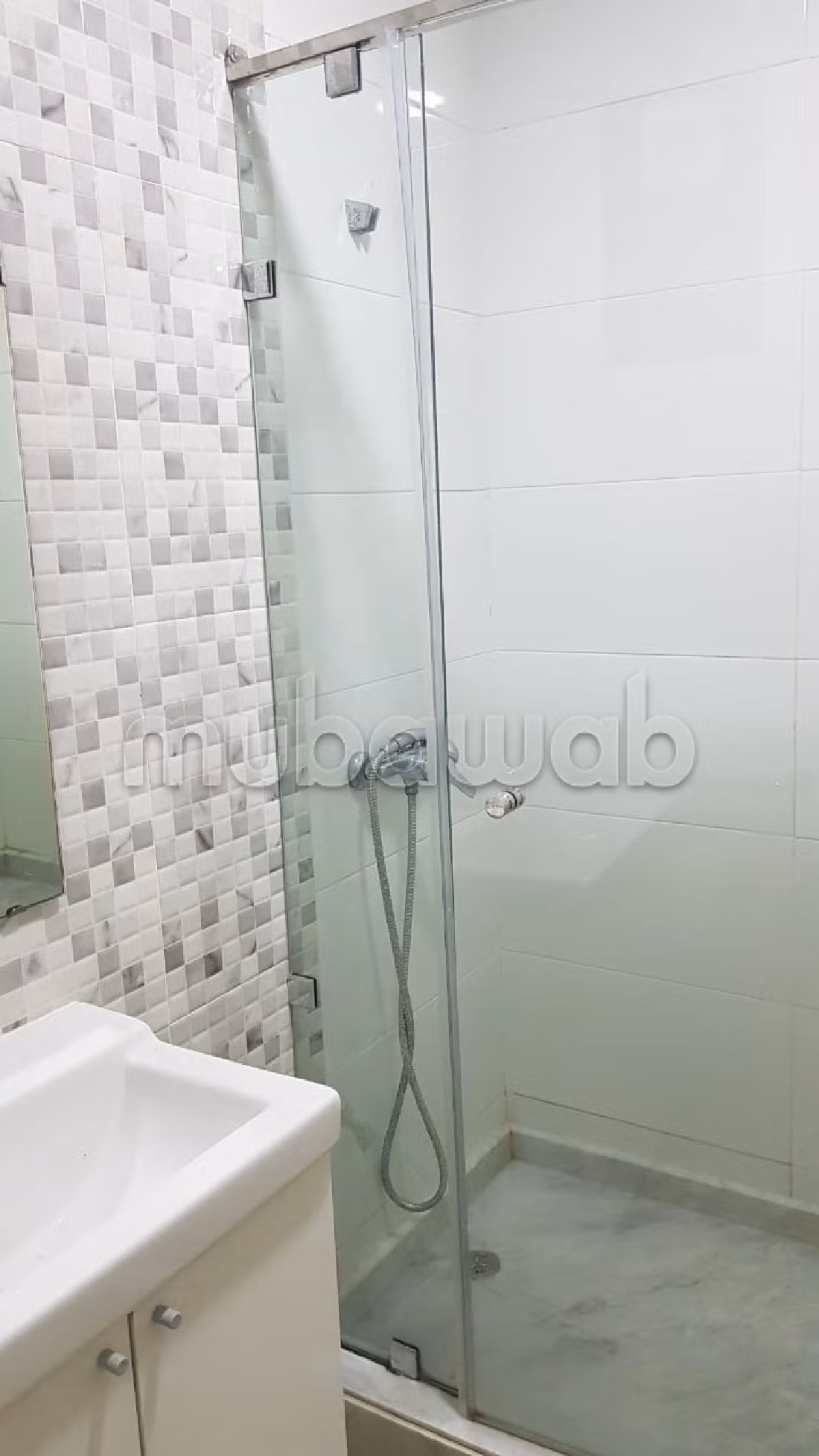 Sale of a lovely apartment in Kébibat. 3 rooms. Lift and terrace. 