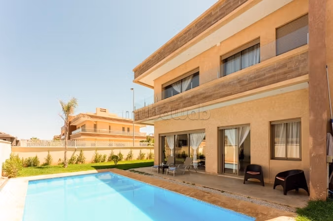 Magnifique villa à louer pour vos vacances à Riad Al Atlas. 5 grandes pièces. Cheminée et service de conciergerie. 