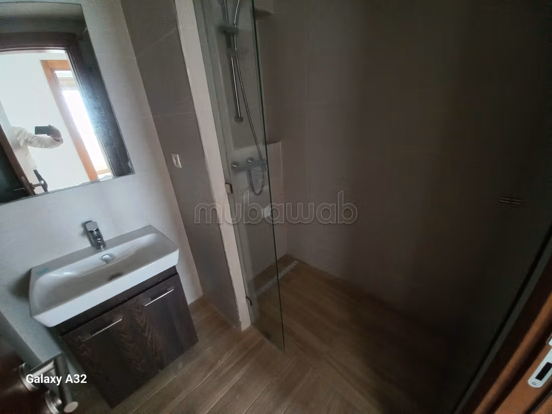 Location appartement 2 chambres, NEUF, AVEC VUE MER, à 7 minutes du morocco mall dans une résidence securisée. Jardin, piscine