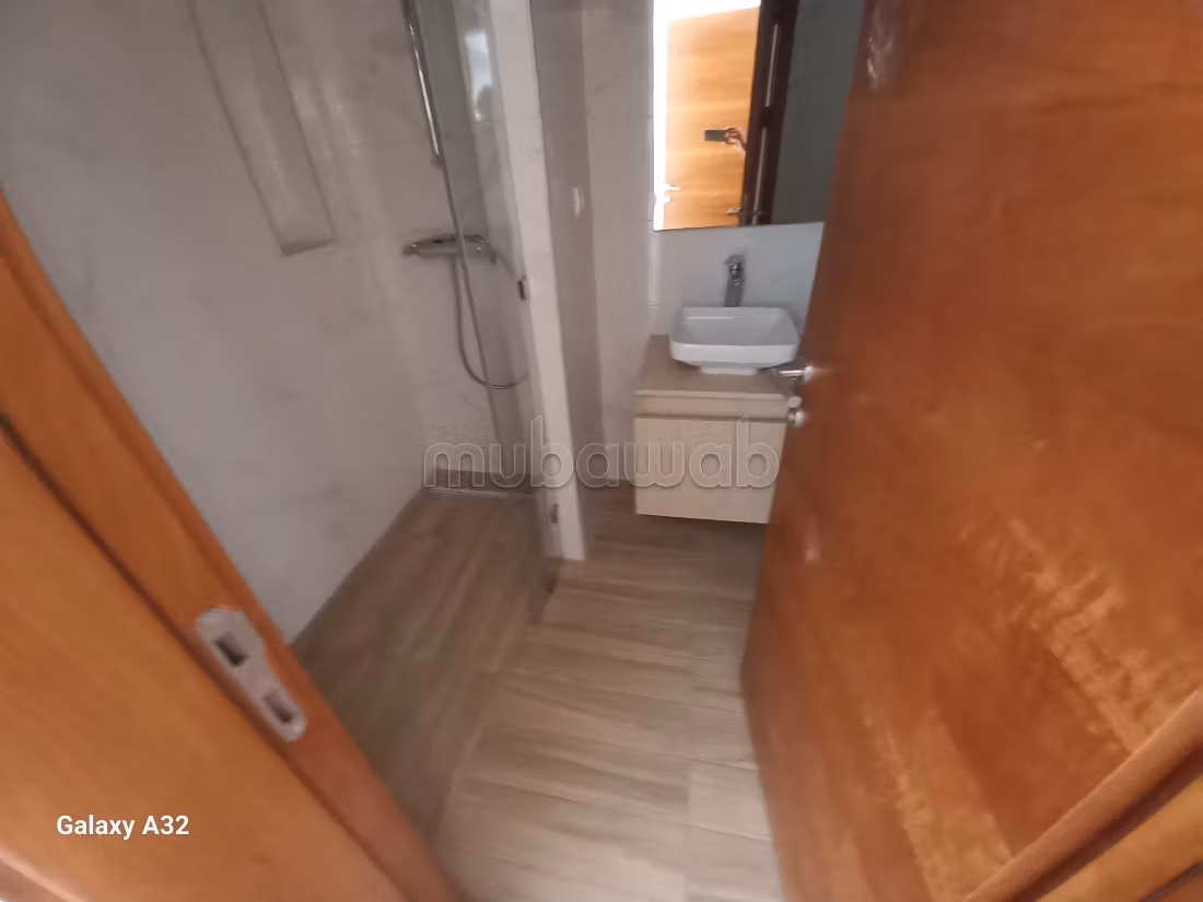 Location appartement 2 chambres, NEUF, AVEC VUE MER, à 7 minutes du morocco mall dans une résidence securisée. Jardin, piscine