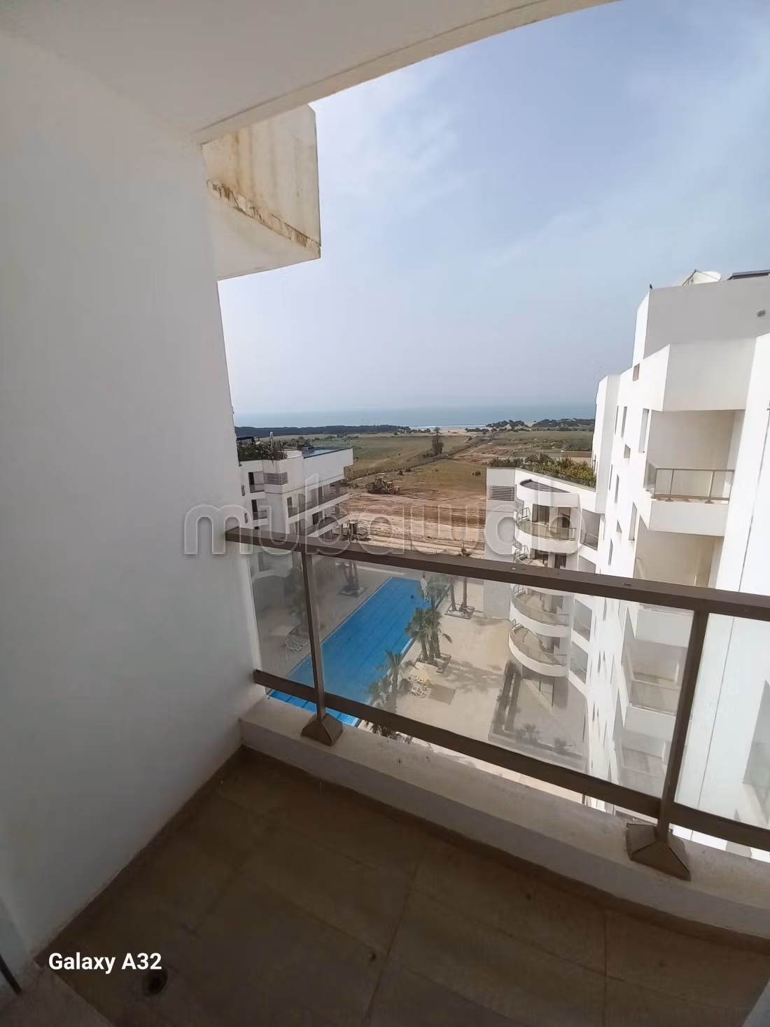 Location appartement 2 chambres, NEUF, AVEC VUE MER, à 7 minutes du morocco mall dans une résidence securisée. Jardin, piscine