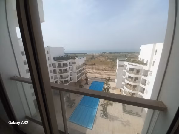 Rent an apartment in Ain Diab Extension. 3 large living areas. Private garden, No Lift. 