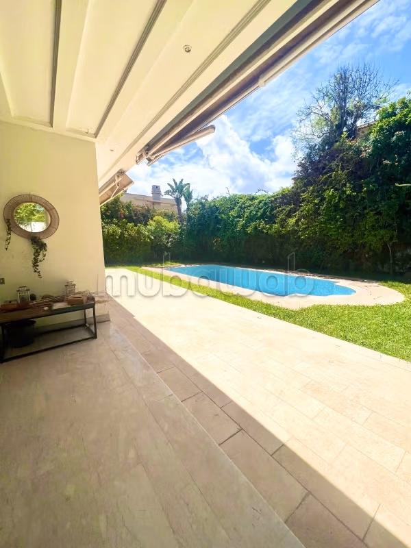 Magnificent villa for rent in Ain Diab. 7 large living areas. Fireplace and caretaker