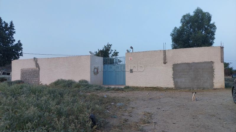 Terrain constructible de 610 m², clôturé et viabil