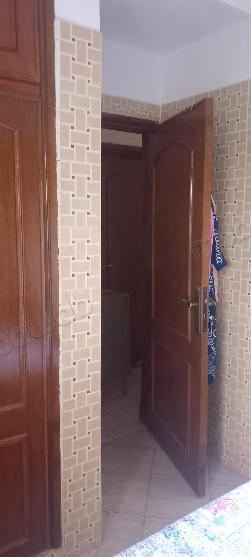 Appartement au rez de chaussée surélevé