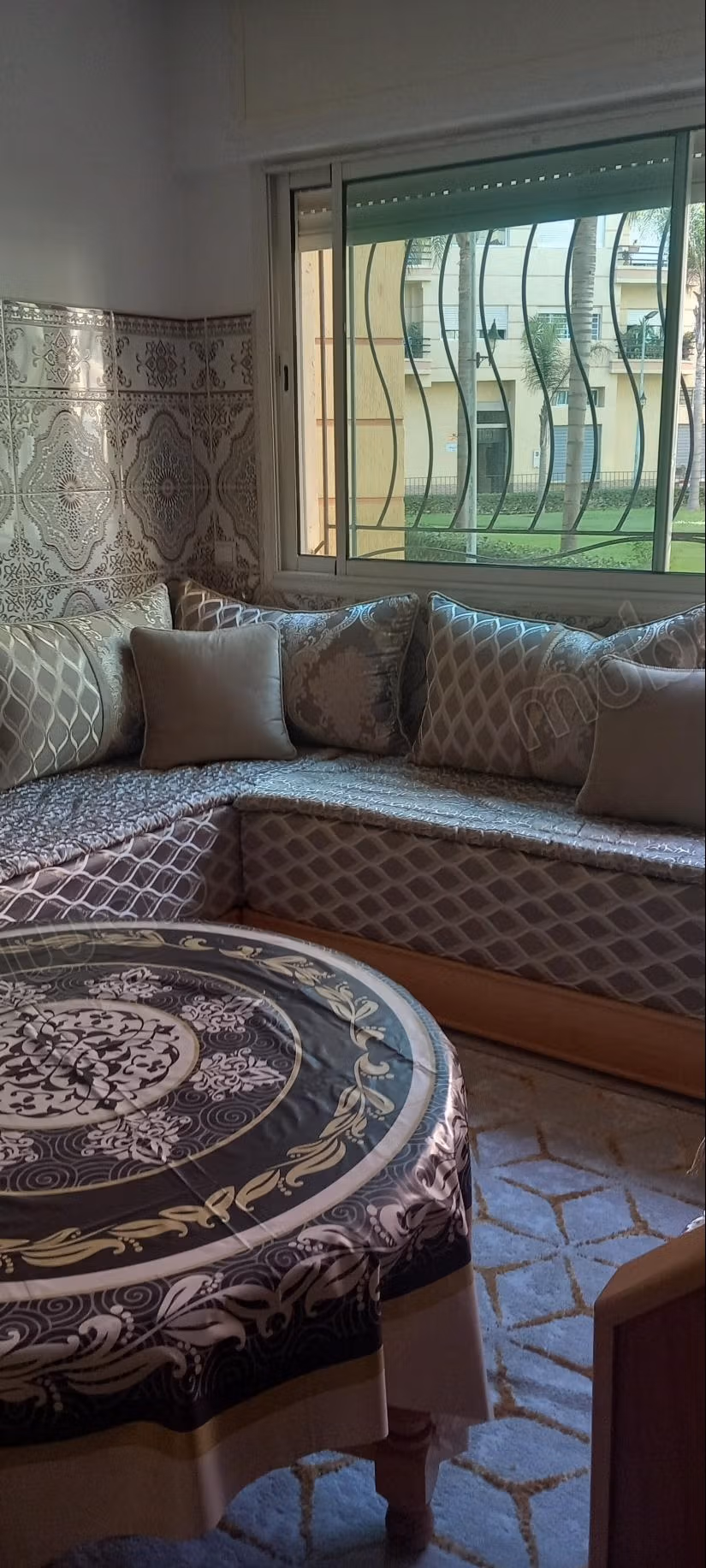 Appartement au rez de chaussée surélevé
