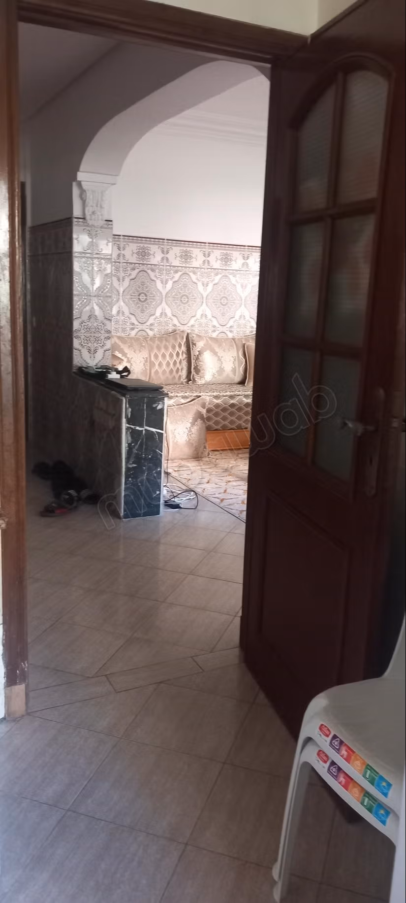 Appartement au rez de chaussée surélevé