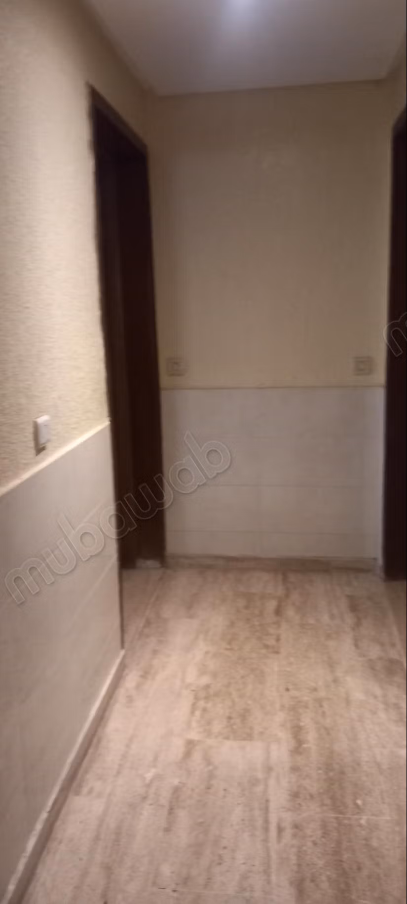 Appartement au rez de chaussée surélevé