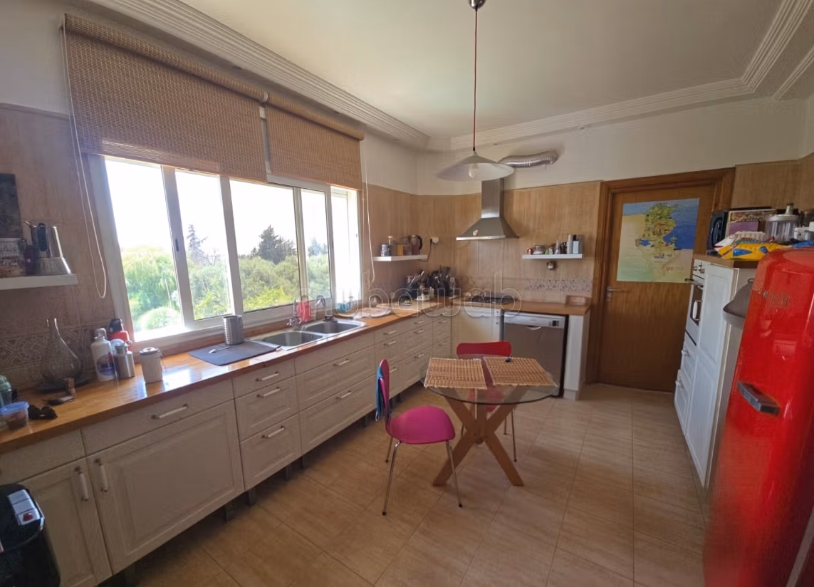 Un piano di villa con piscina a Gammarth