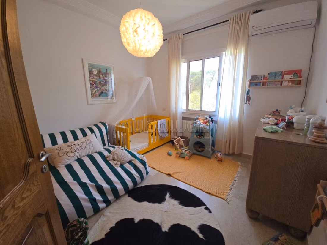Un piano di villa con piscina a Gammarth