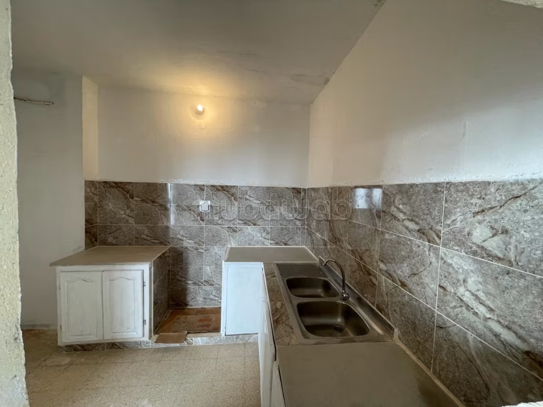 Maison avec grande cour a vendre
