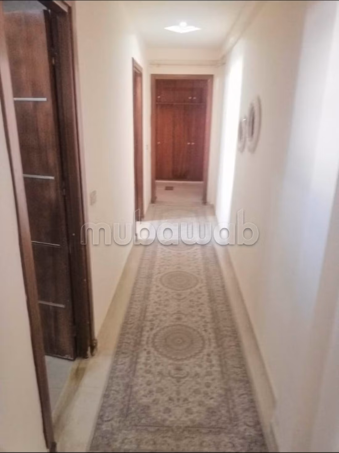Vend appartement à Nouvelle Medina. Surface totale 124 m². Antenne parabolique, résidence sécurisée.