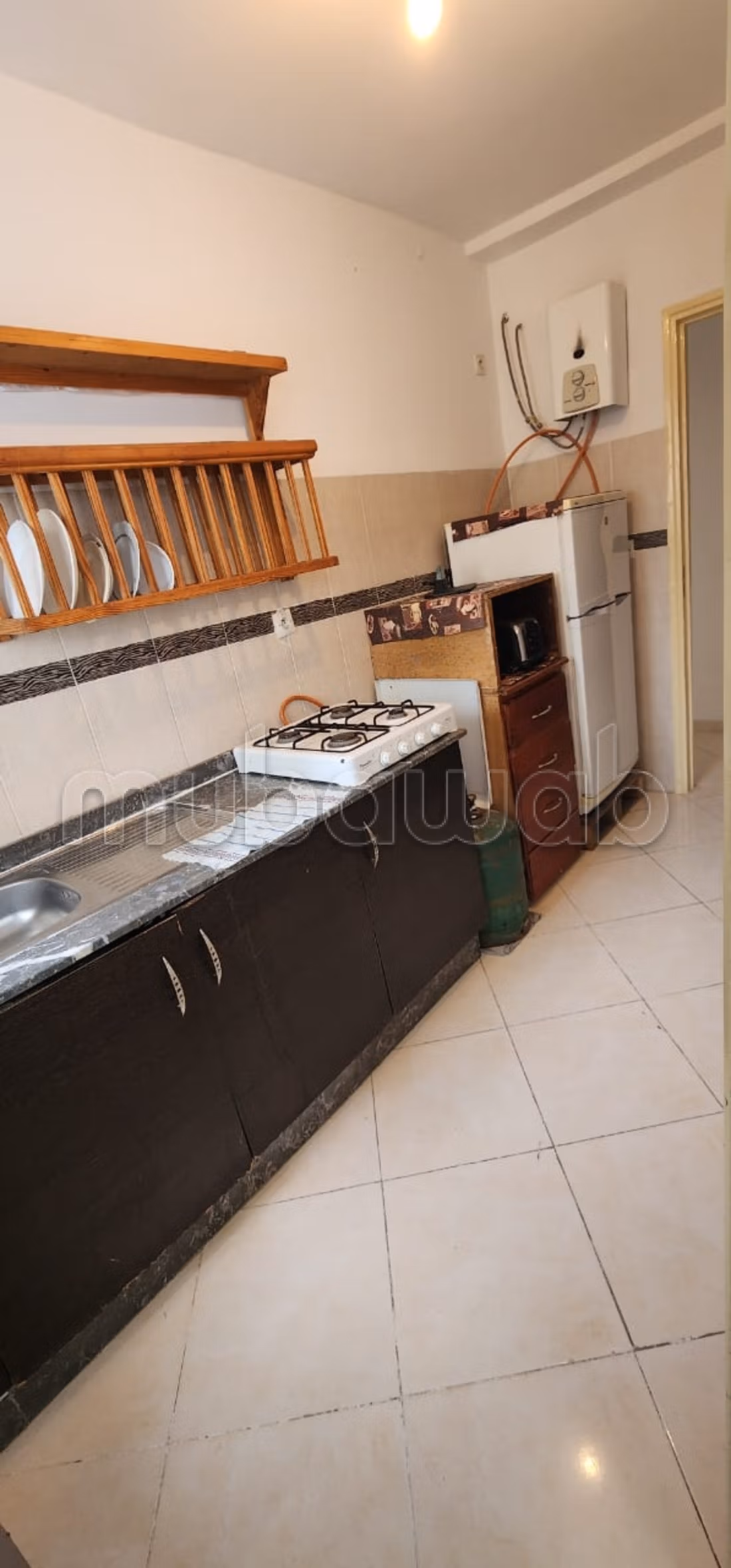 Apartment for rent by the month at Al Baraka complex in Aouama