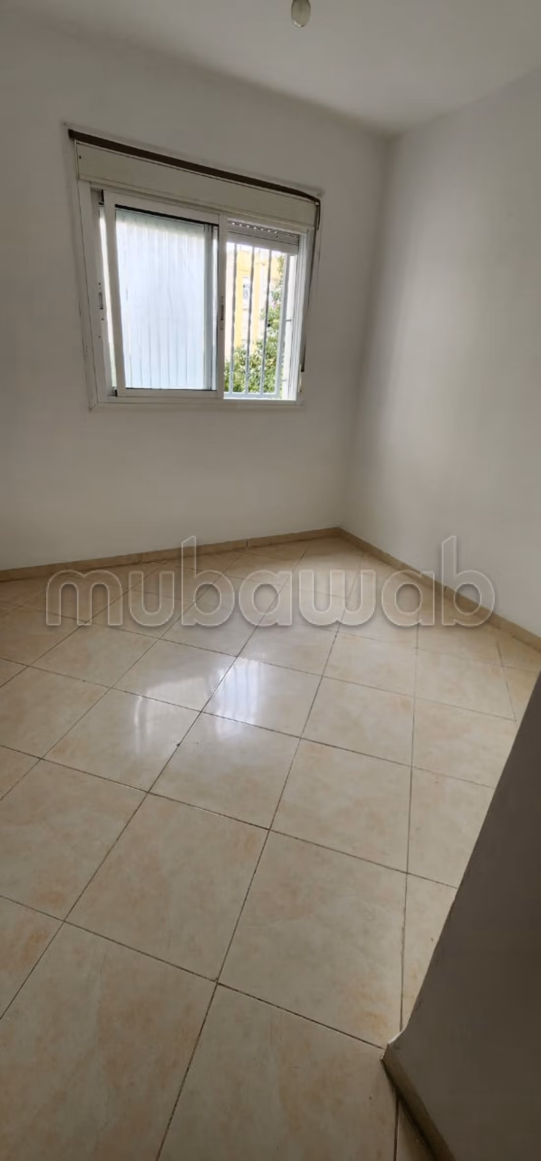 Apartment for rent by the month at Al Baraka complex in Aouama